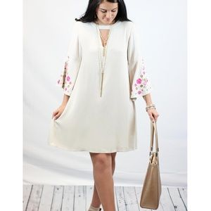 Brand new embroidered sleeve dress